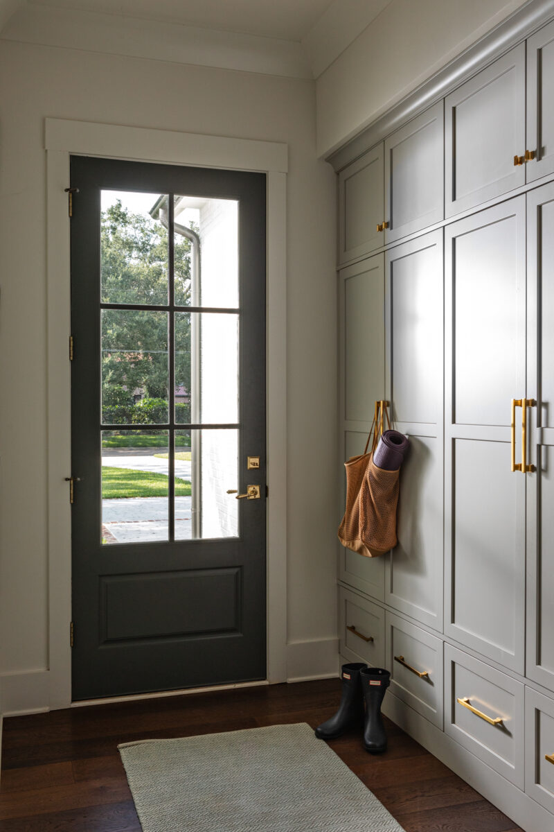 Mudroom with gray built-in cabinets | Twin Construction