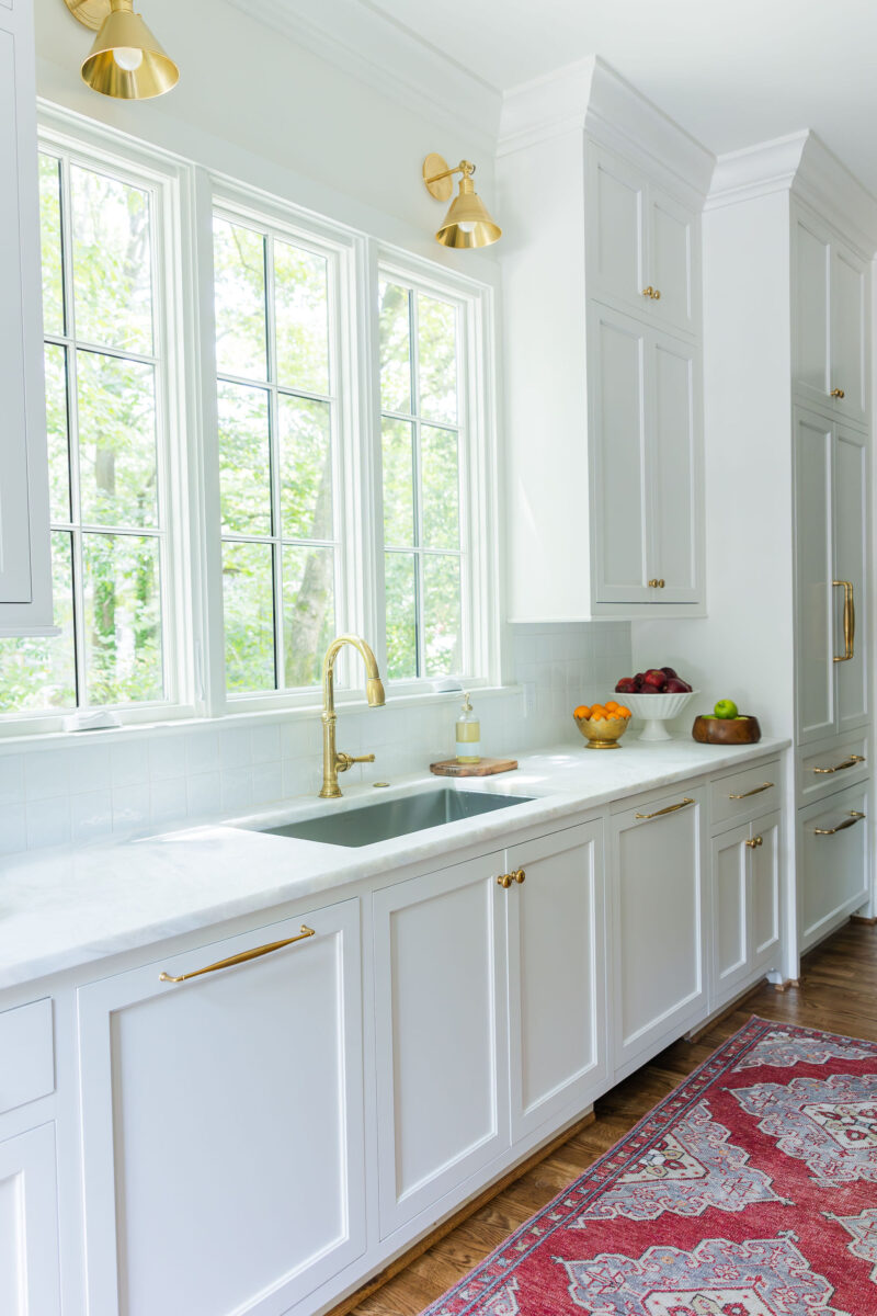 Custom Panel Ready Dishwasher and Sink with unlaquered brass faucet | Twin Construction