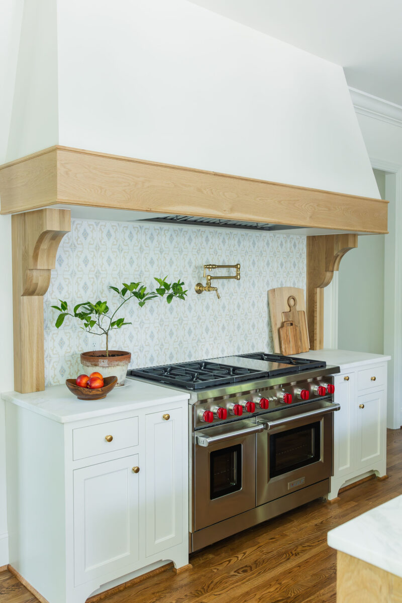 Custom Hood with White Oak and terracotta tile | Edgewood Beauty Transitional Kitchen | Twin Construction 