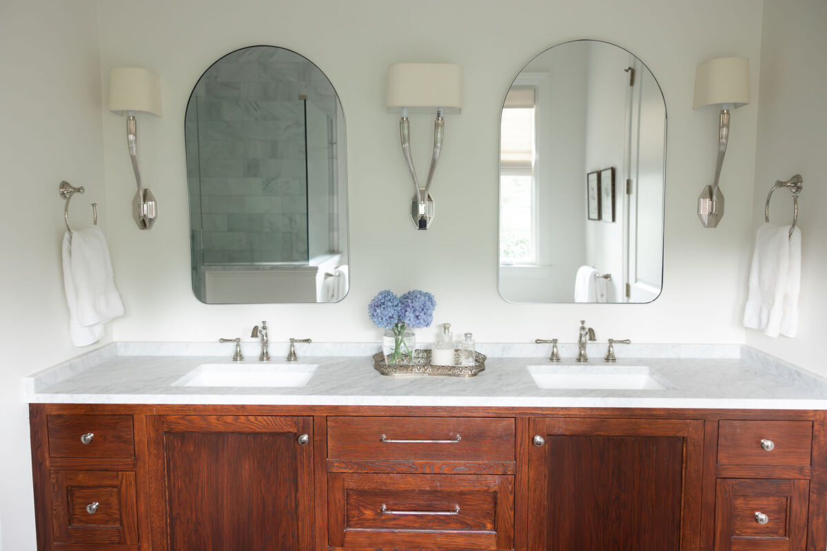 Master Bathroom Suite with warm wood cabinets | Twin Construction