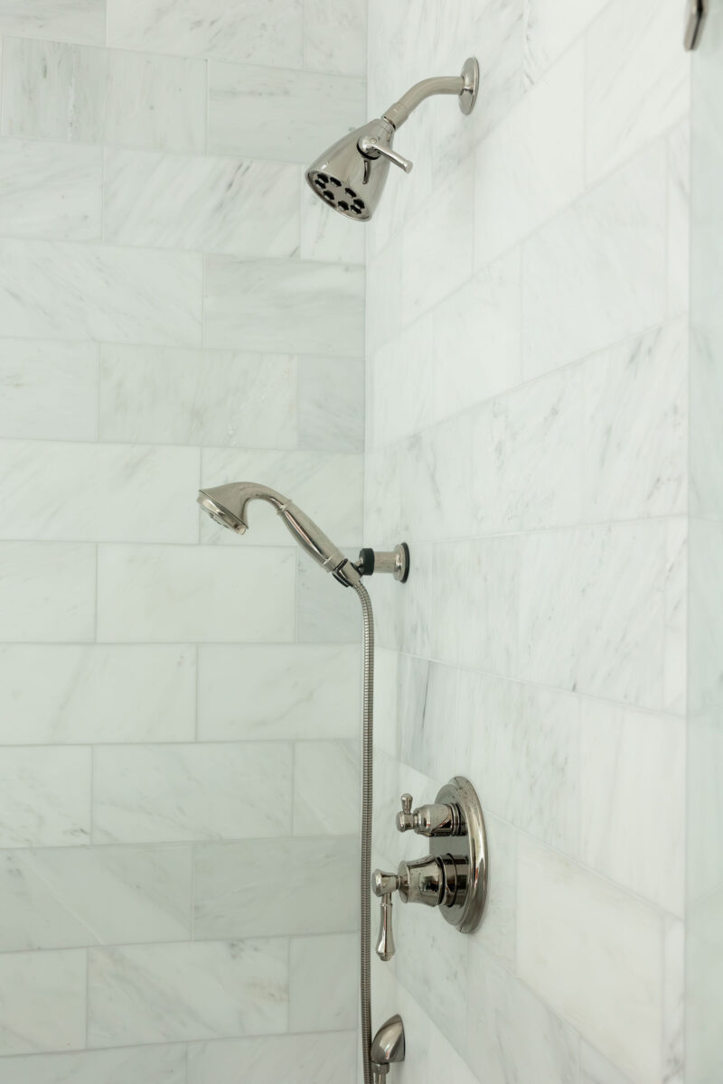 Marble Shower Tile and Polished Nickel | Twin Construction 