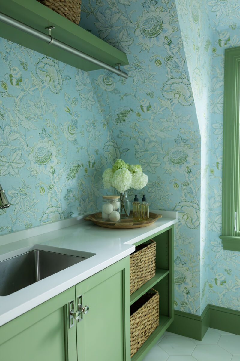 Green and Blue Laundry Room with floral wallpaper | Twin Construction 