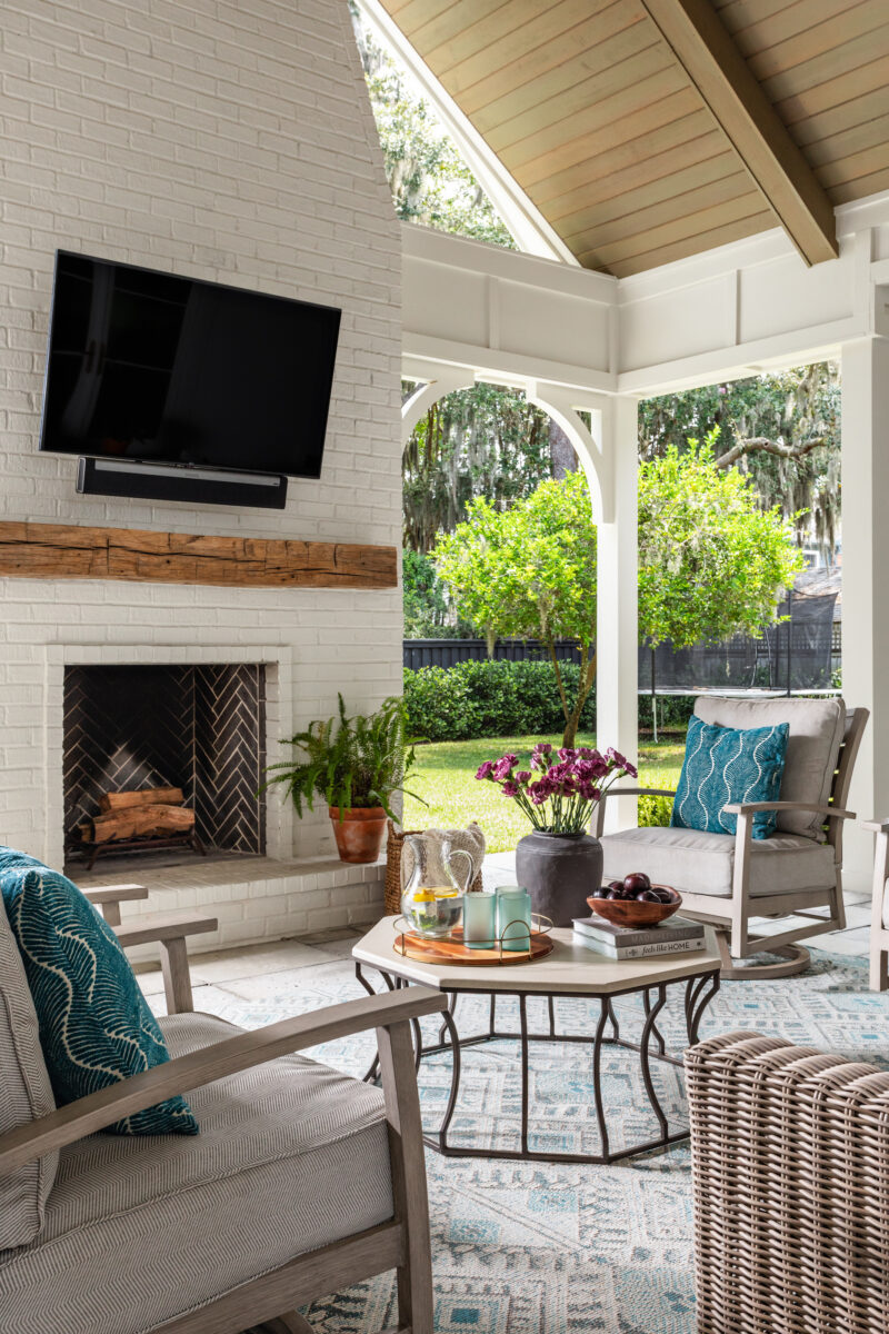 Covered Porch with Brick Fireplace | Twin Construction