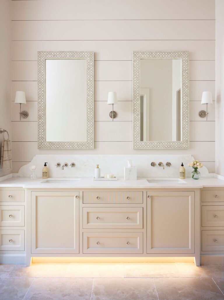 Lit kick plate in primary bathroom | Twin Construction
